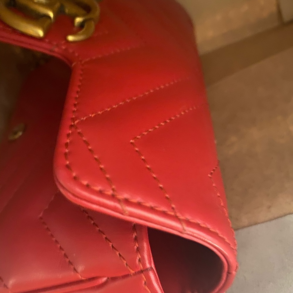 Red Gucci purse